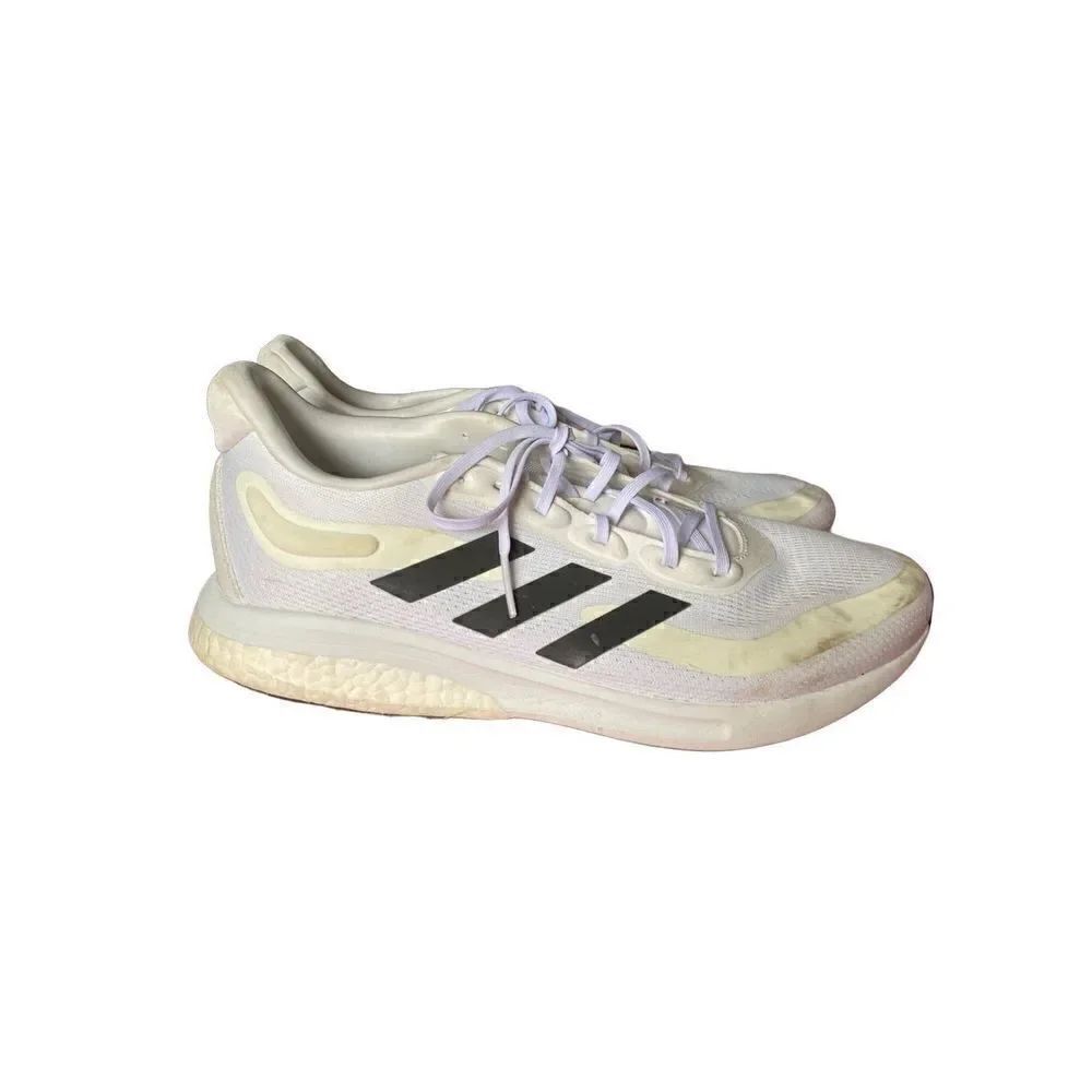 Adidas supernova men’s white and black running shoes size 11.5.